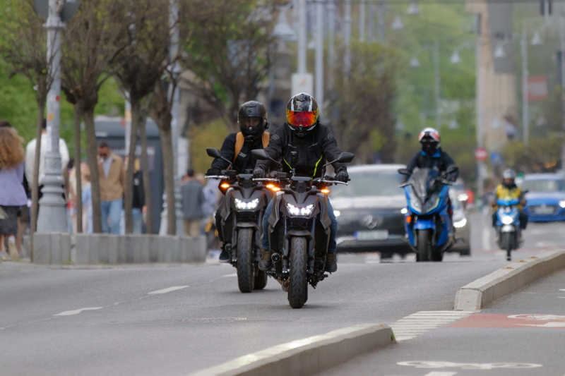 Motorcyclists in traffic 1
